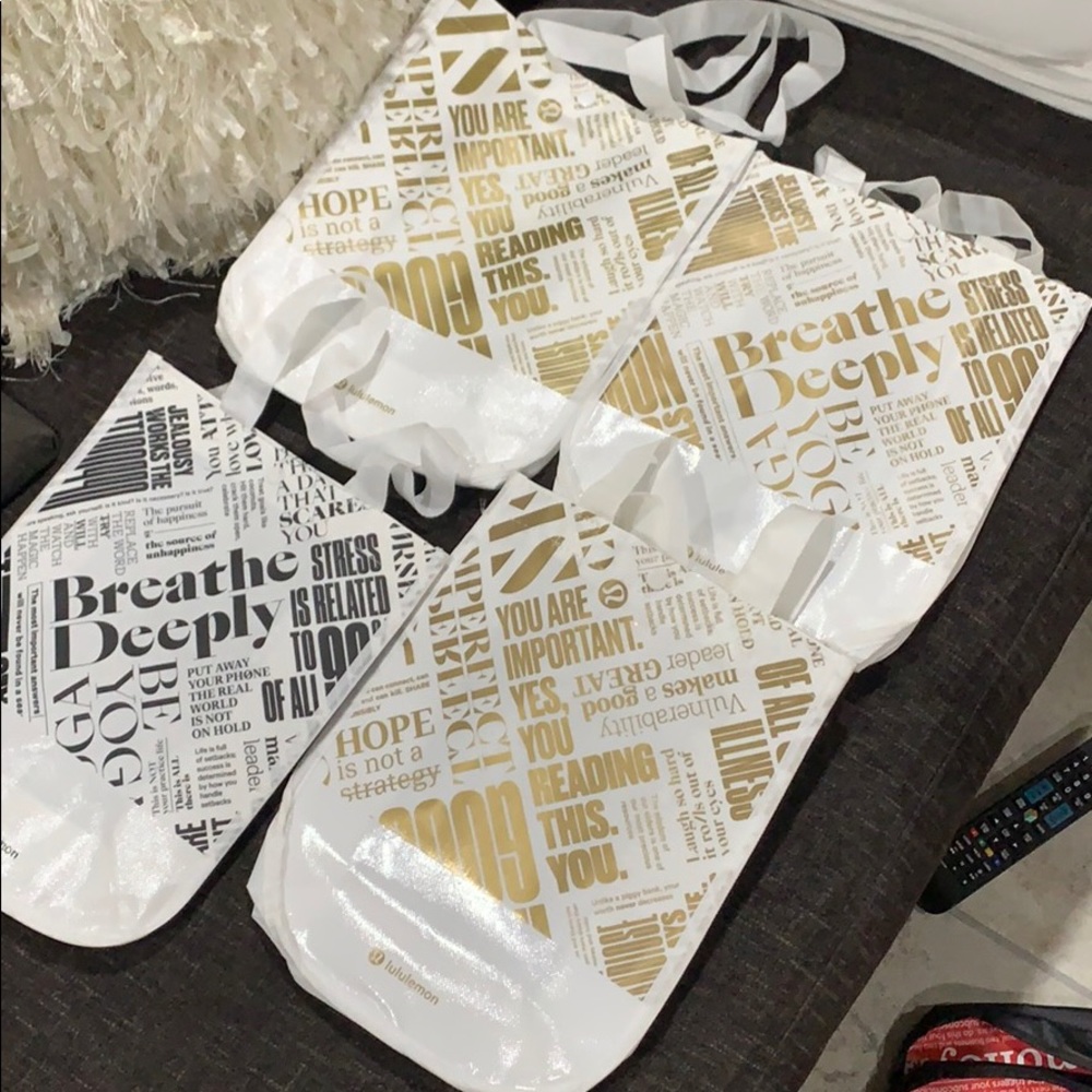 4 small lululemon bags
